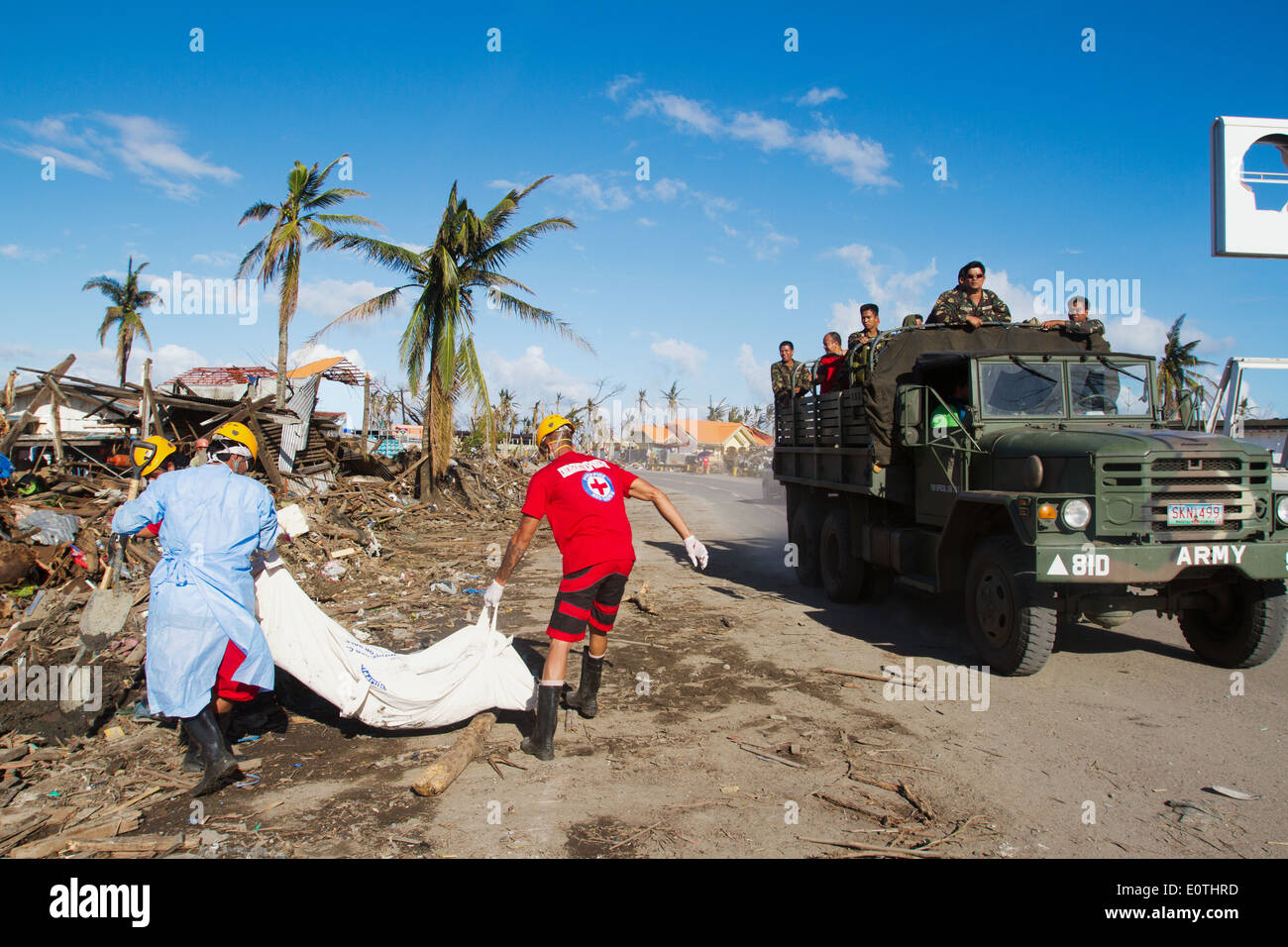 Rescue team carrying a corpse Tacloban City Philippines Stock Photo