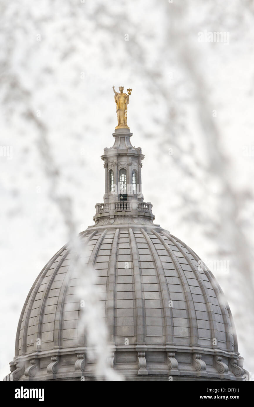 statue of "Miss Forward" on top of the capitol building in Madison