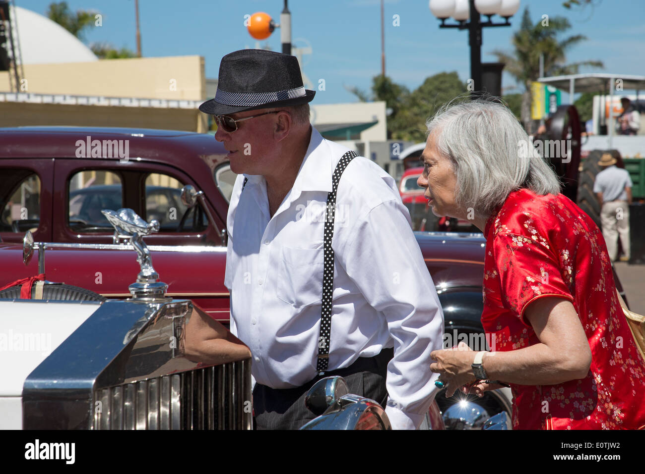 Art Deco Weekend visitors at Napier New Zealand admiring a vintage Rolls Royce Stock Photo