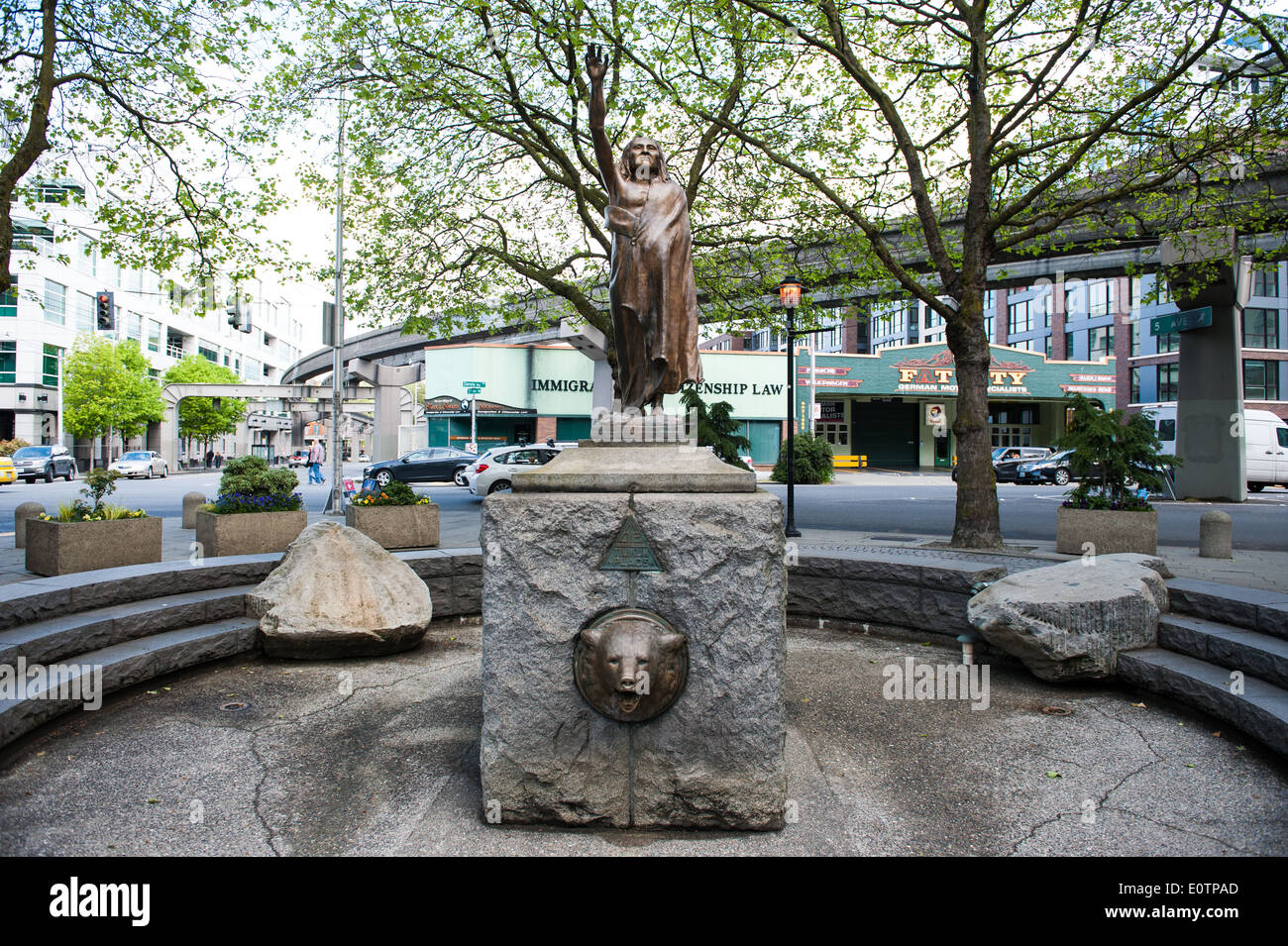 A statue of Chief Seattle stands in the center of Tilikum Place plaza