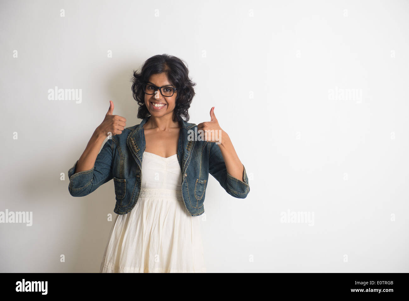 Indian adult woman thumbs up hi-res stock photography and images - Alamy