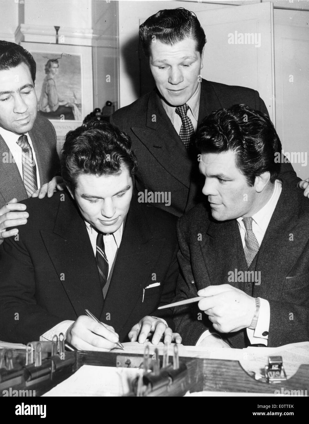 Boxer Albert Finch watches Arthur Howard sign-up for match Stock Photo