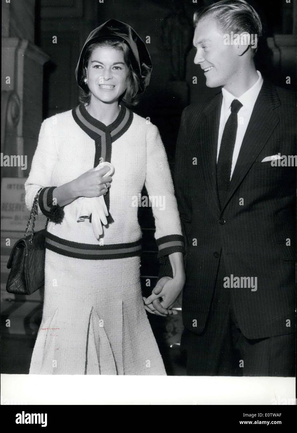 Oct. 02, 1960 - The 25-year-old Count of Suffolk, who is a friend of the Duke of Kent and of Princess Alexandre, married Miss Suzanne Litman, the daughter of an important French manufacturer, in Neuilly. Here is a picture of the newlyweds leaving the town hall. Stock Photo