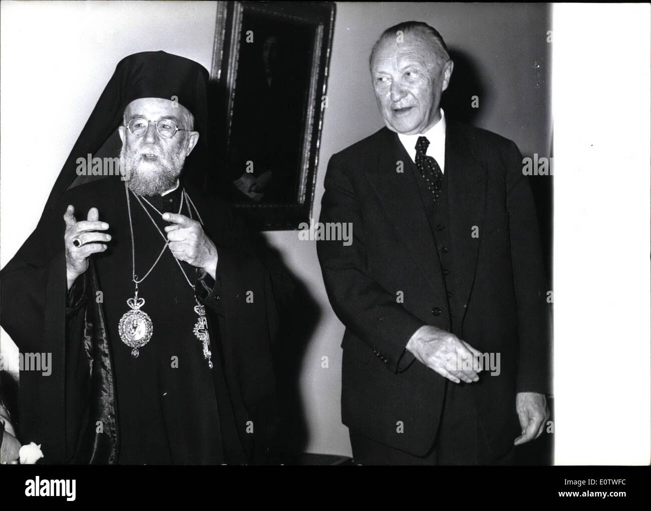 Aug. 08, 1960 - Photographers are better than canons...said the Patriarch of Antiochia when reporters ''shot'' him in the Palais Schaumburg in Bonn/West-Germany. Maximus IV, Patriarch of Antiochia, who took part in the World Eucharistic Congress in Munich, came to Bonn for a visit to Federal Chancellor Dr. Adenauer (left) on Aug. 11th. Stock Photo