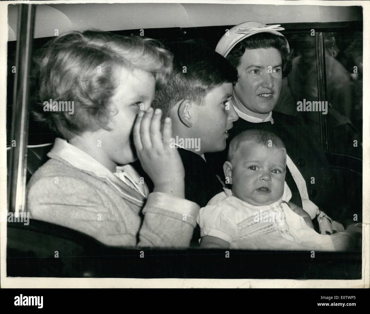 Aug. 08, 1960 - Queen Mother celebrates 60th birthday. Visit from her grandchildren: The Queen Mother today celebrates her 60th. birthday - and among the many visitors to Clarence House was her grandchildren - Prince Charles - Princess Anne and baby Prince Andrew. Photo shows baby Prince Andrew is held by his big brother Prince Charles - as they left in the car with Princess Anne after visiting their Grandmother this morning. Stock Photo