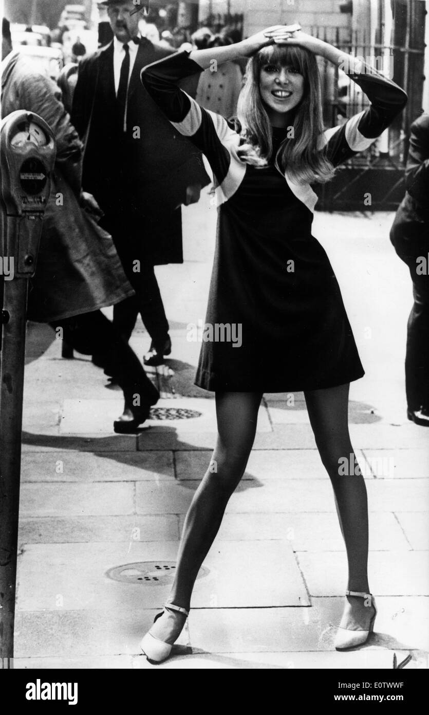 Model Pattie Boyd stands on a London street Stock Photo