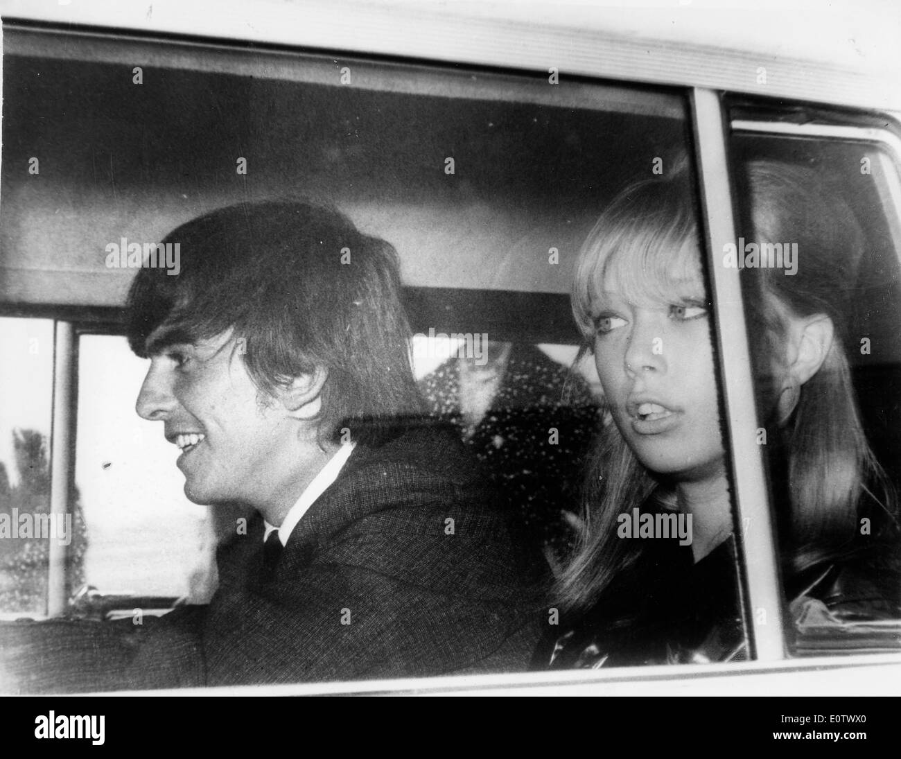 Beatle George Harrison and wife Pattie Boyd returning from the airport Stock Photo