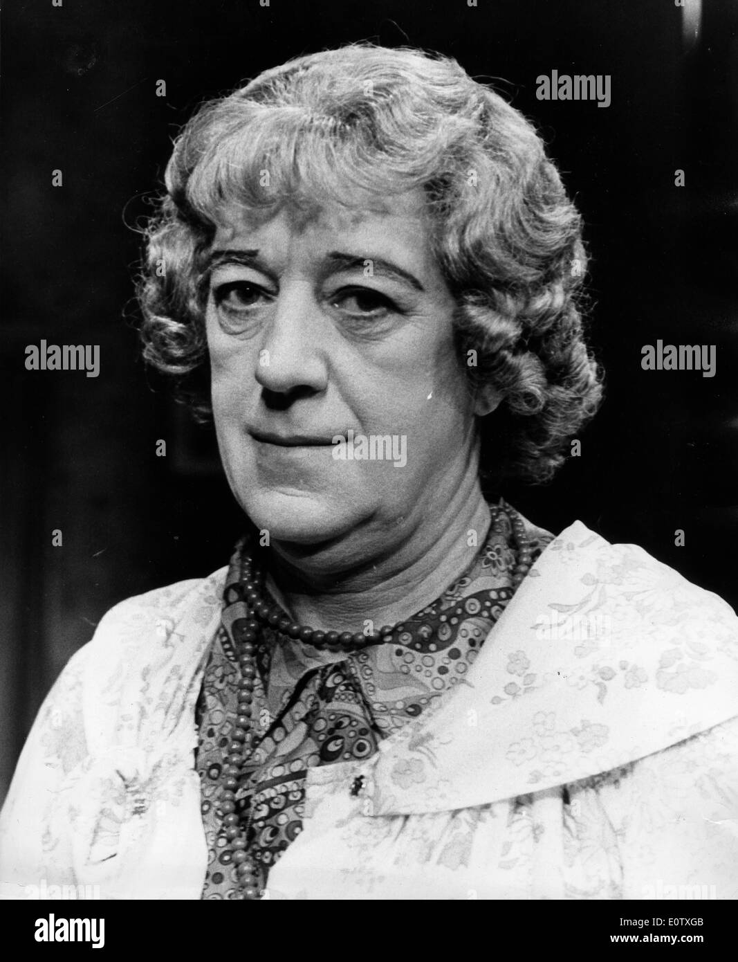 Actor Alec Guinness dressed up as a woman Stock Photo