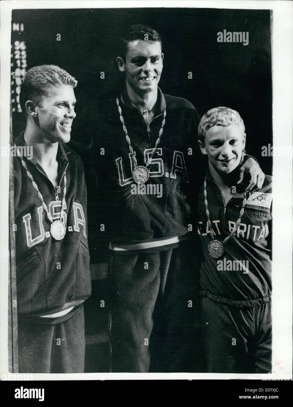Sep. 04, 1960 - 4-9-60 Olympic Games in Rome. Winners of Men's 10M Diving Event. Bronze for Phelps. Brian Phelps, the 16-year old British diver, won a Bronze Medal when he finished third in the Men's 10 Meters Diving Event. R. Webster of the U.S.A. and G. Tobian, also of the U.S.A. finished first and second respectively. Keystone Photo Shows: Pictured after receiving their medals are Robert Webster (Centre), the winner, G. Tobian (left), second, and Brian Phelps (right), third. Stock Photo