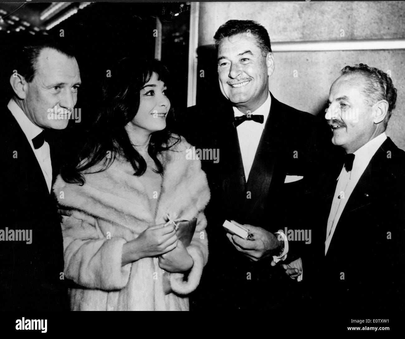 Actress Juliette Greco talking with friends at an event Stock Photo