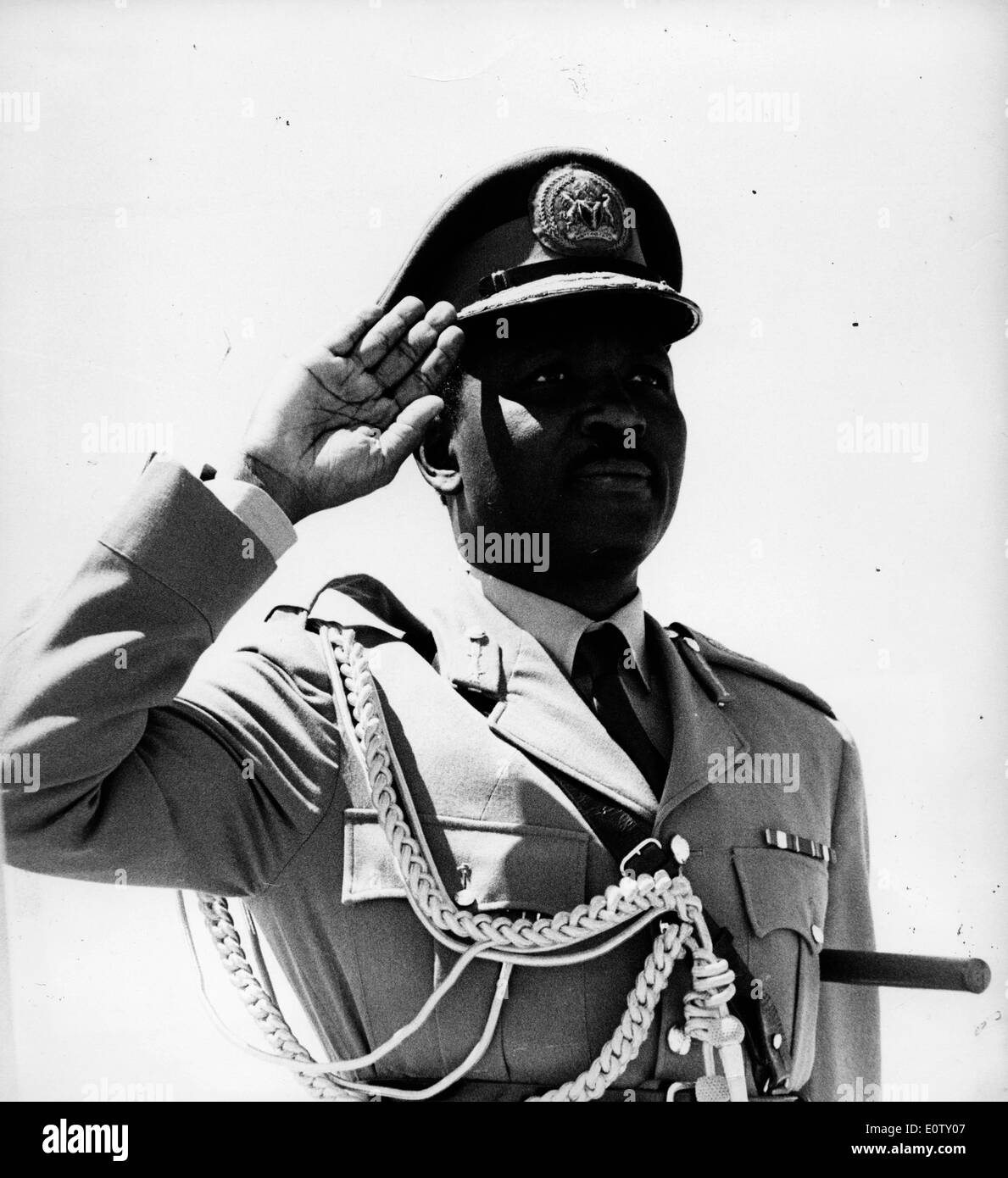 Head of State of Nigeria Yakubu Gowon standing at attention Stock Photo ...