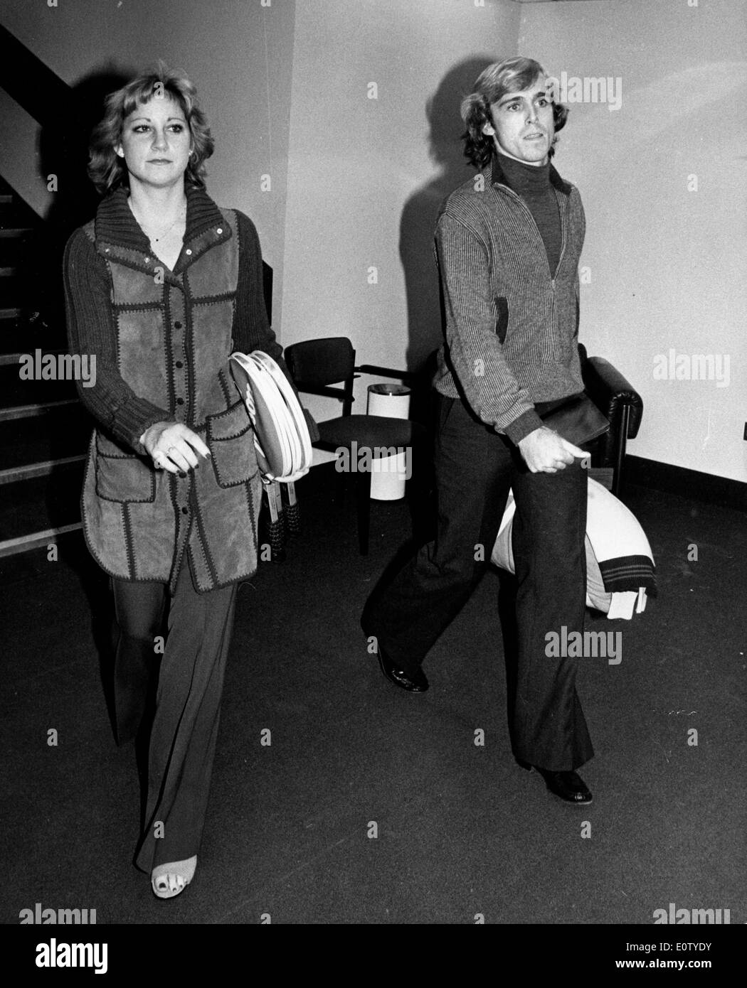 John Lloyd walking with his wife Chris Evert Stock Photo