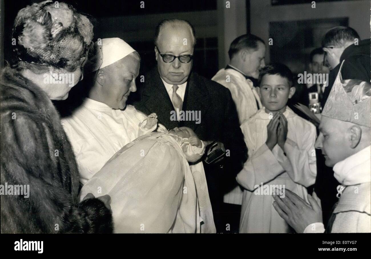 Oct. 10, 1960 - Grandson of Prince Xavier de Bourbon Parme Christined: The Christening of Prince Eduard Xavier, Granson of Prince Xavier de Bourbon Parme, was held at the chapel of Miraculous medal, Paris, this afternoon. Photo Shows Surrounding the nurse holding the baby are Princess Xavier de Bourbon Parme, the godmother, and Prince Ferdinand de Lobkowicz, godfather. Stock Photo