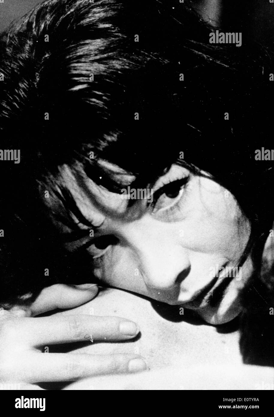 Portrait of singer Juliette Greco laying down Stock Photo