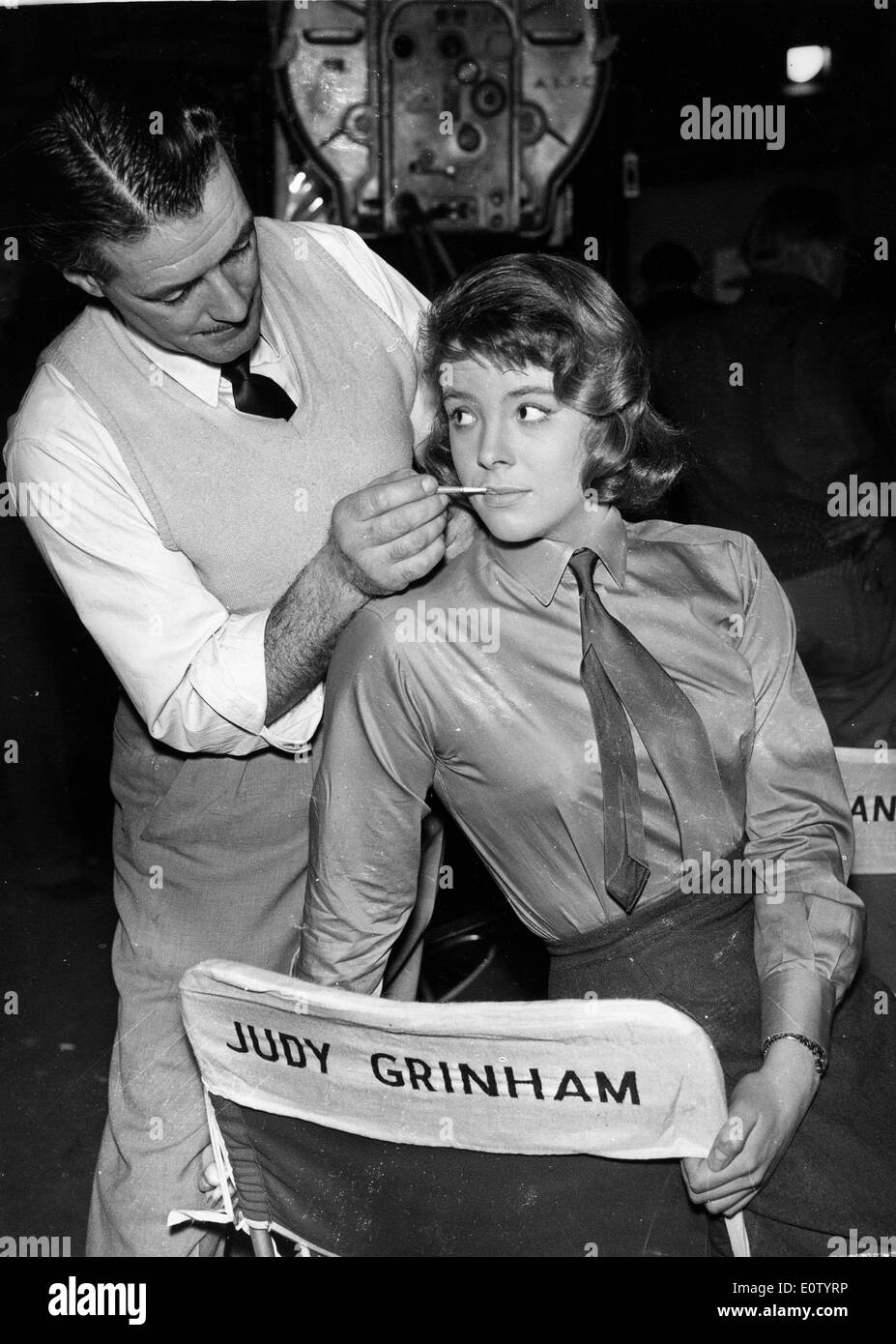 Swimmer Judy Grinham getting her makeup done for a commercial Stock Photo