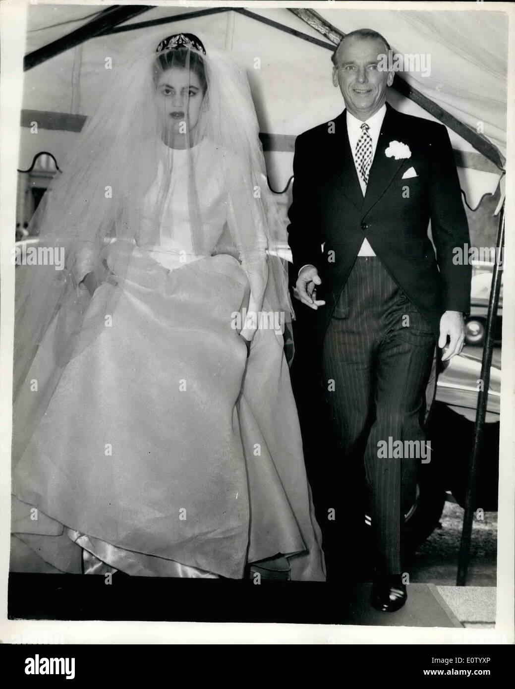 Oct. 10, 1960 - Daughter Of Douglas Fairbanks Weds: The wedding took place this afternoon at the Guards Chapel of Miss Daphne Fairbanks - 20 year old daughter of Mr. and Mrs. Douglas Fairbanks - old son of a London Shipowner. Phot Shows Douglas Fairbanks and his daughter - the bride - arriving for the wedding this afternoon. Stock Photo