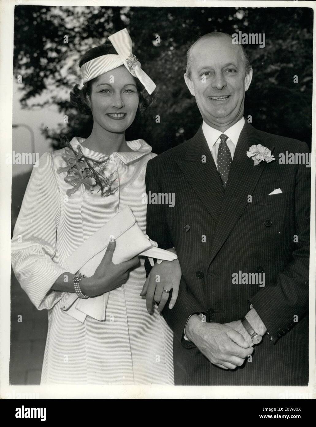 Oct. 10, 1960 - Viscount Astor weds.: 53-year old Viscount Astor of Cliveden, and 29-year old Miss Bronwen Pugh, the London model and former television announcer, were married today at Hampstead Register Office. They announced their engagement last night. This is Viscount Aster's third marriage. The bride is the daughter of sir Alun Pugh, the country court judge, and Lady Pugh, of Pilgrim's Lane, Hampstead. Photo shows the bride and groom after the ceremony today. Stock Photo