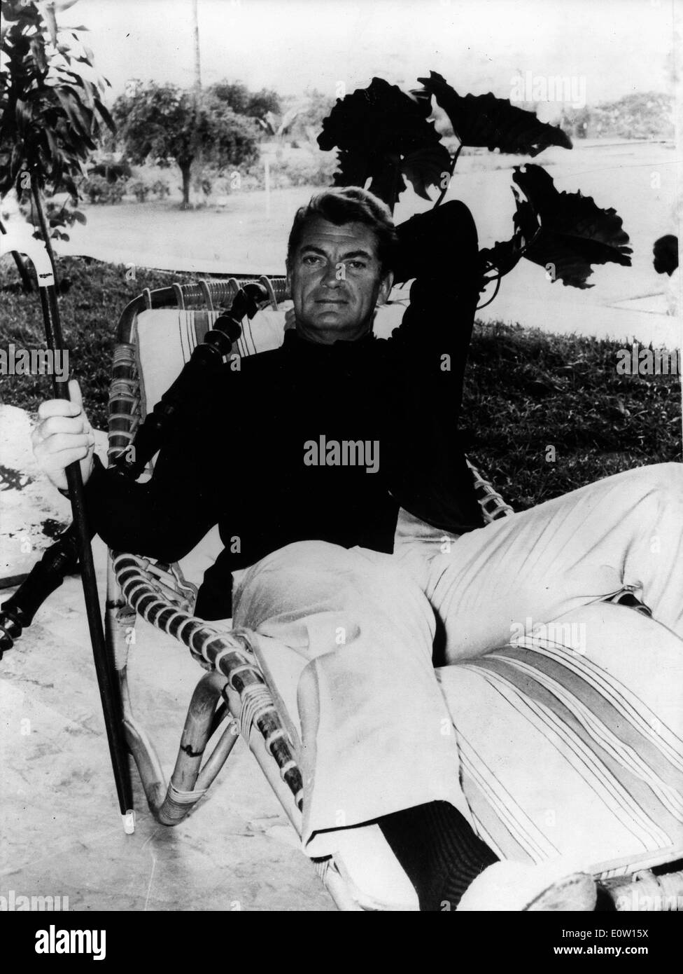 Portrait Jean Marais lounging outside Stock Photo