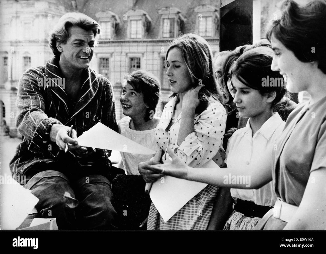 Jean Marais signing autographs on the streets of London Stock Photo