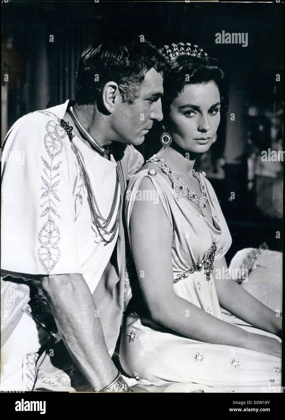 Nov. 11, 1960 - Sir Laurence Olivier and Jean Simmons: play the main parts in the latest Hollywood monster film ''Spartacus'' which was made im ''Super-Technirama- 70'' system and in colour, costing 12 million Dollars. Sir Laurence Olivier plays the part of Crassus, a Roman warrior and one of the richest men of his time; Jean Simmons plays the part of the beautiful slave Varinia. Crassus desires her, the wife of slave leader Spartacus (played by Kirk Douglas). Photo shows Crassus has made Varinia to his slave and gives her wealth and luxury Stock Photo