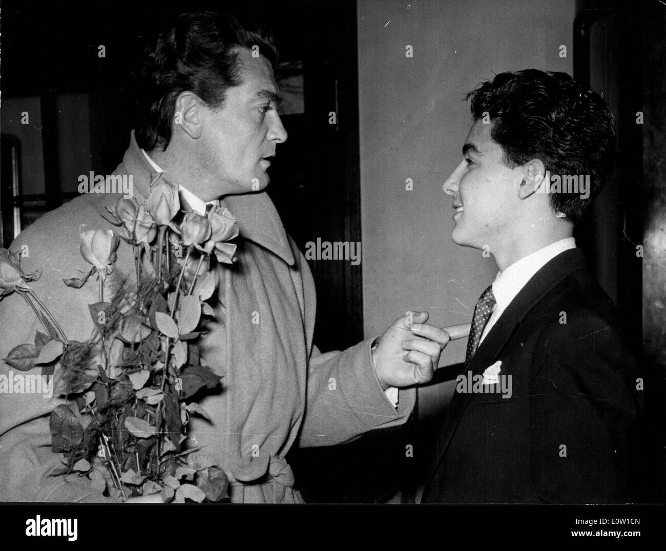 Actor Jean Marais talking to a young man Stock Photo