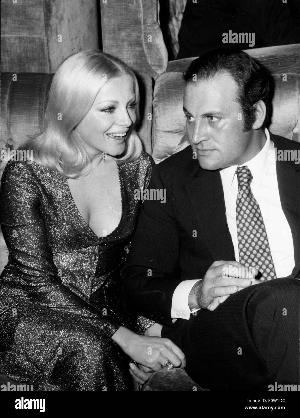 Actress Virna Lisi seated with her husband Franco Pesci Stock Photo