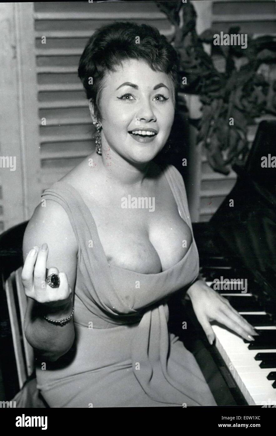 Dec. 06, 1960 - This buxom 25 year-old English singer, Gail Mitchell, is in Paris right now where she will start off performances in a famous Saint-Germain des Pres cabaret in a few days. Stock Photo