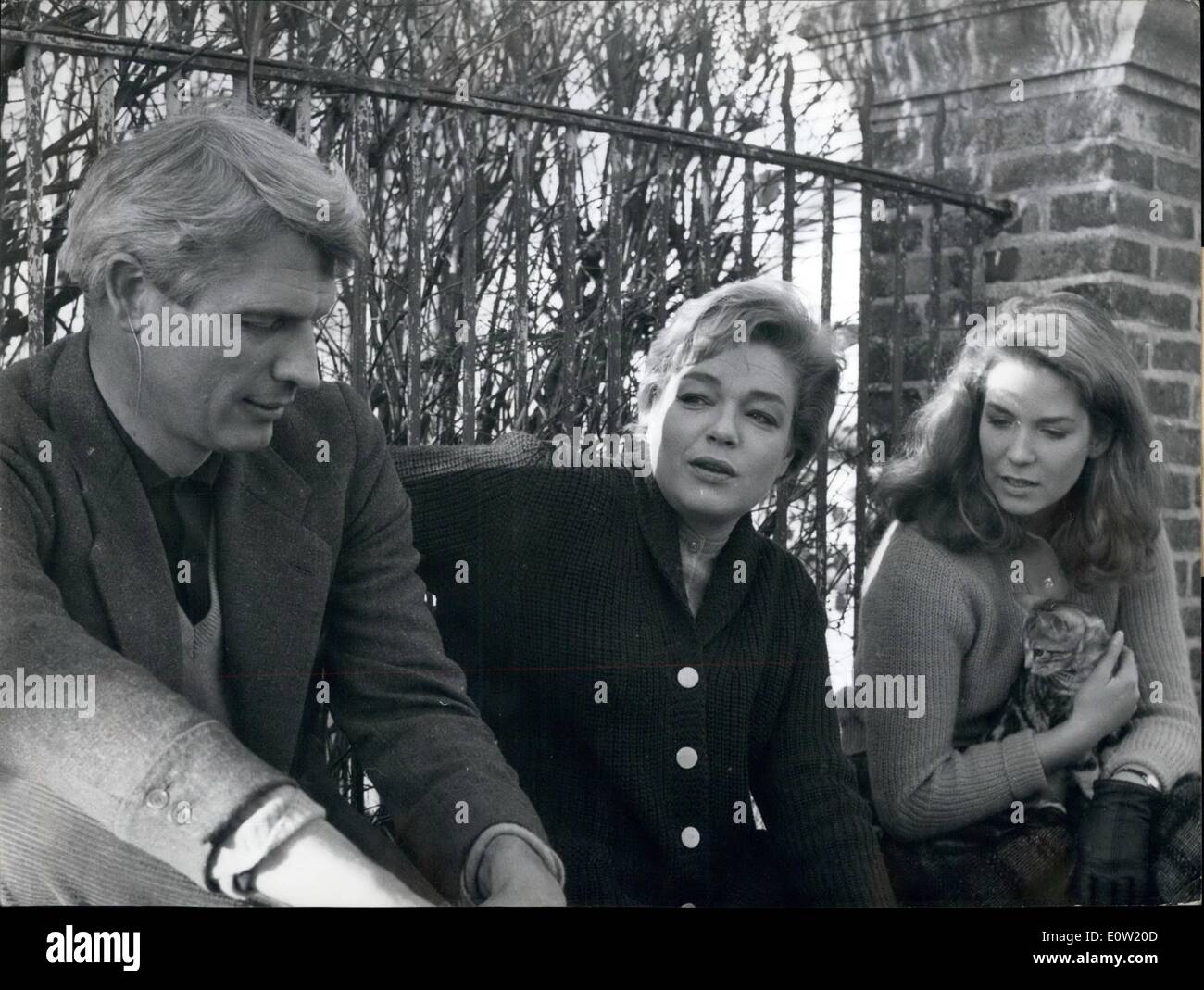 Dec. 12, 1960 - Simone Signoret Back To French Films: Simone Signoret, Yves Montand's Wife, The Famous French Actress, Is Starring In A French Film For The First Time In Five Years. The Film (''Les Mauvais Coups'') Is Based On Roger Vailland's Story Which Was Awarded The Concourt A Prize. Co-Starring With Her Are Alexandra Stewart And Reginald D. Kernan, An American Six-Footer Who Was A Doctor Before He Became An Actor. From Left To Right: Reginald D. Kernan, Simone Signoret And Alexandra Stewart Pictured On The Location. Stock Photo
