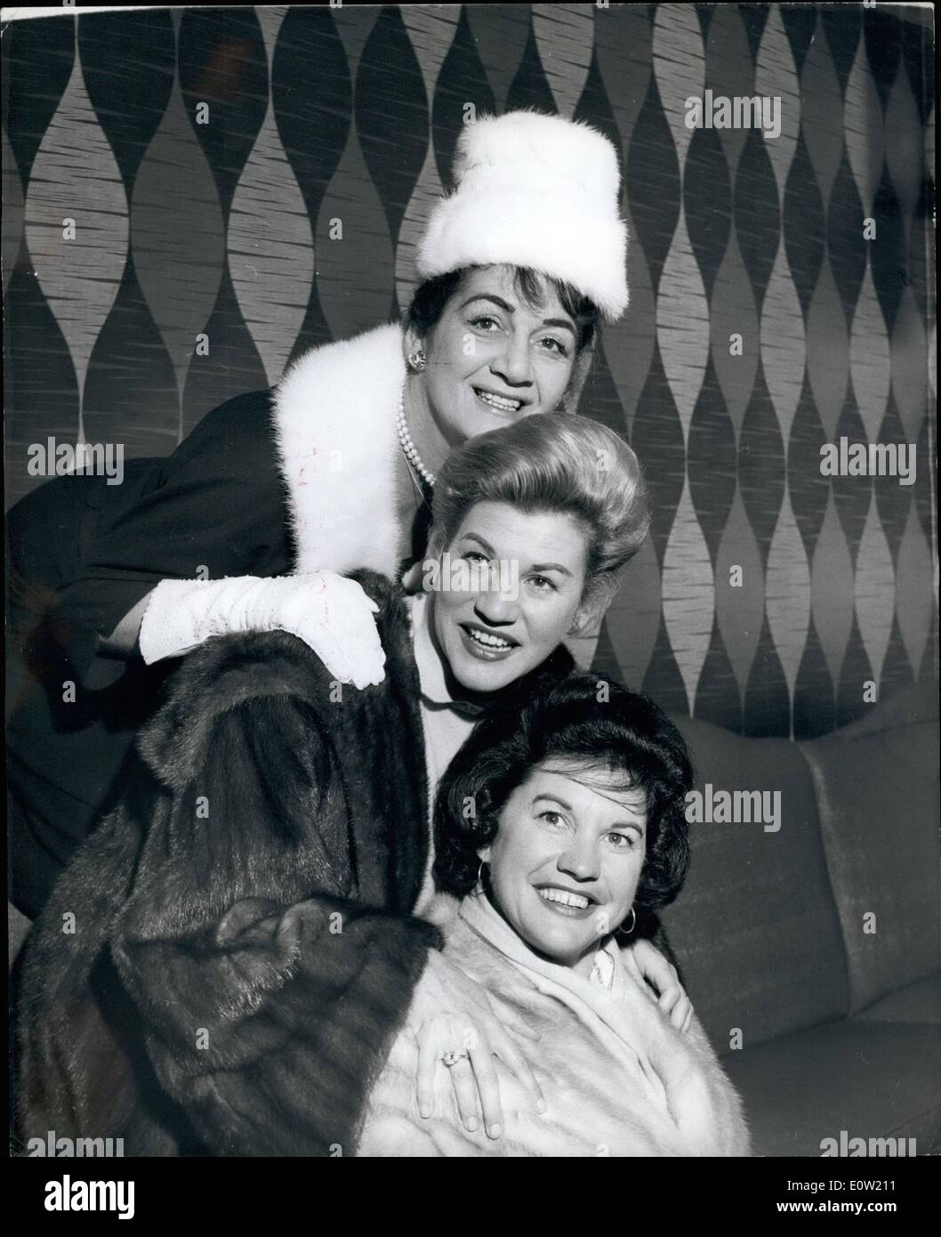 Dec. 12, 1960 - The Andrews Sisters In London; The famous singing trio ''The Andrew Sisters'' have arrived in London for a season at London's ''Talk of the Town''. This is their first visit to Britain for nine years. They have starred in 17 big films and have made record sales of more tan 60,000,000. Picture Shows: The Andrew Sisters pictured in London yesterday. (from top to bottom ) Laverne, Patty and Maxene. Stock Photo