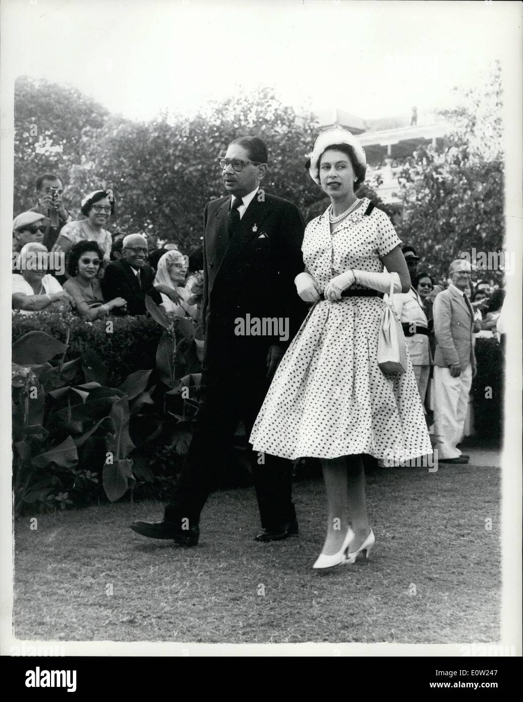 Feb. 02, 1961 - Royal Indian Tour. Queen Goes to Bombay races: H.M. The Queen and the Duke of Edinburgh yesterday spent a relaxed afternoon at Bombay Races - after a strenuous morning. Photo shows H.M. The Queen wears a blue polka-dot white dress - during her visit to Bombay Races. Stock Photo