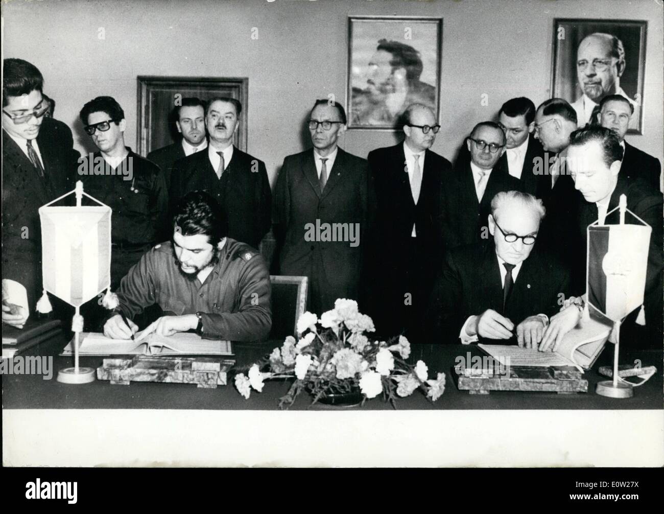 Dec. 12, 1960 - Trade contract between East-Germany and Cuba signs: In East-Berlin, on Dec. 17th a trade contract between East-Germany and Cuba was signed, with a value of 45 million Dollars Connected with this trade contract is an agreement about technical scientific collaboration for the years 1961 to 1965. Photo Shows Ernesto Guevara, on right Minister for Foreign Trade and German trade of East-Germany, Heinrich Rau signing the contract. Stock Photo