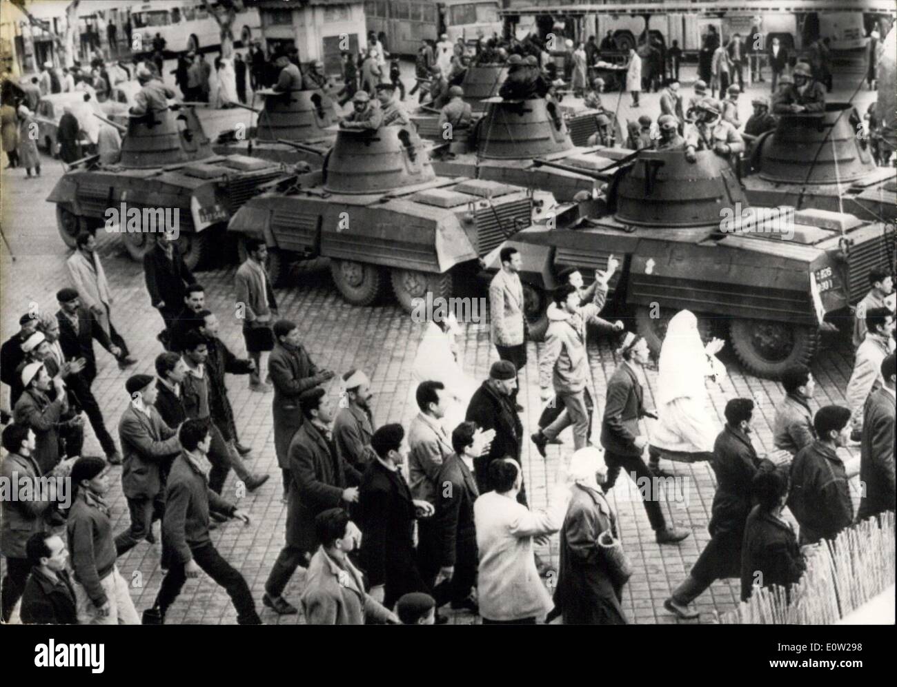 Dec. 15, 1960 - Algiers: Unrest Continues: Photo Shows Native demnonstrators pass unchallanged before heavy tanks surrounding the native section. Stock Photo