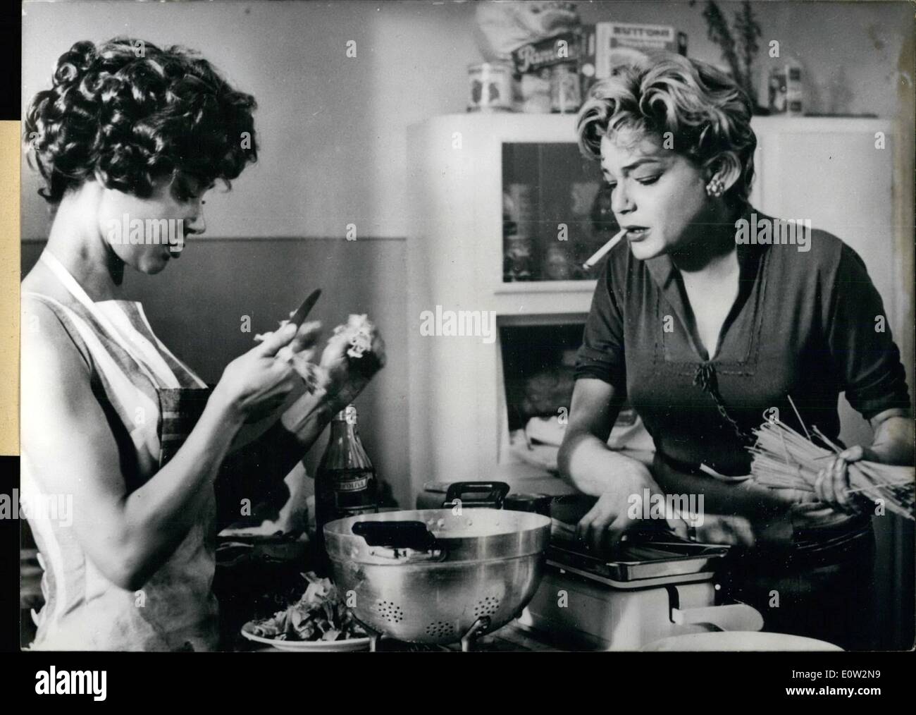 Jan. 01, 1961 - Light girls - heavy troubles: Emmanuele Riva (Emmanuele Riva) the main actress in ''Hiroshima - mon amour'' - (left) and Oscar Prize winner Simone Signoret (Simone Signoret) right are playing in an unusual film which comes to us from Italy; Aduna (Aduna) and her companions. A new rule which has been issued in Italy a short time ago and which orders the closing of the brothels is here critically illustrated. The film is directed by Antonio Pietrangeli (Peitrangeli) Stock Photo