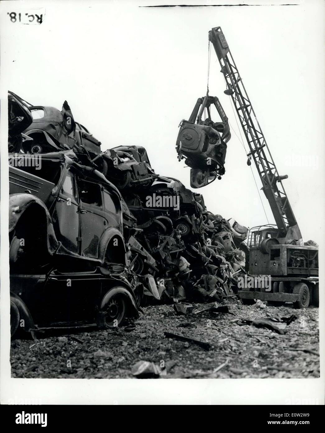 Feb. 16, 1961 - And Still The ''Old Crocks'' Pile Up. ''Ten Year Test'' - Brings In The Relics: Car breakers' yards throughout the country are busier now than at any time before - mainly because of the Ministry of Transport ''Ten Year Test'' - which requires cars of ten years of age - or more -to be tested to a set standard for breakers - steering and lighting. Owners of many 'old crocks' are now even entering their vehicles for the test - but are just sending them for scrap. Some of the breakers' yards are having to refuse any more - even free - because they are so full-up Stock Photo