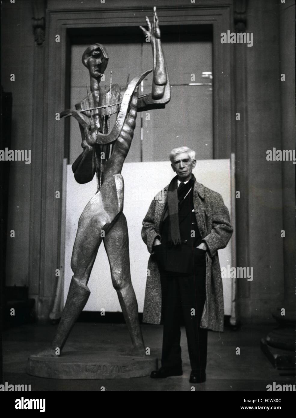 Jan. 01, 1961 - WORKS BY RUSSIAN BORN SCULPTOR - ON SHOW IN LONDON. Eighty-three exhibits by Russian born Ossip Zadkine - said to be one of the greatest modern sculptors of the day - are being shown at the Tate Gallery in London. This is the first major exhibition of his works here - but they have been seen in New York and Paris etc.. The exhibition shows his progress as a sculptor from 1954 to the present day. Keystone Photo Shows:  Ossip Zadkine the sculptor with ''Orpheus'' - a sculpture in bronze - at the Tate Gallery. This is an example of his later work - and is more than six feet tall. Stock Photo