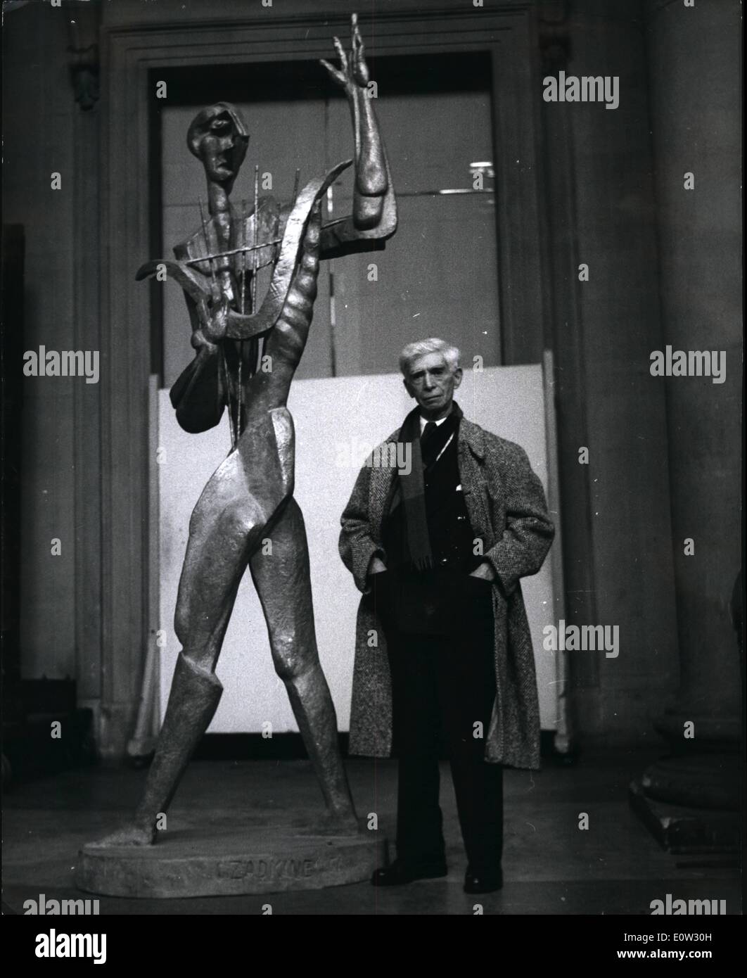 Jan. 01, 1961 - Works by Russian born sculptor - on show in London: Eighty-three exhibits by Russian born OSSIP ZADKINE - said to be one of the greatest modern sculptors of the day-are being shown at the Tate Gallery in London. This is the first major exhibition of his works here - but they have been seen in New York and Paris etc. The exhibition shows his progress as a sculptor from 1934 to the present day. Photo shows OSSIP ZADKINE the sculptor with ''Orpheus'' a sculpture in bronze-at the Tate Gallery. This is an example of his later work-and is more than six feet tall. Stock Photo