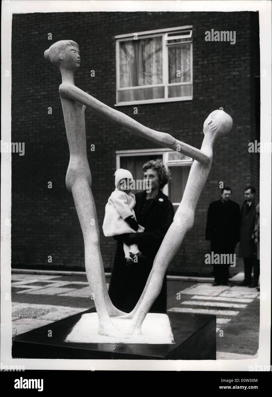 Jan. 01, 1961 - UNVEILING OF ''MOTHER & CHILD'' STATUE AT DULWICH. ''Mother & Child'', by Patricia Rowland, A.R.C.A., a free-standing sculpture positioned outside Lowood Court, an eight-storey block of flats built by Wates Built Homes Ltd. at Farquhar Road, Dulwich Wood Park, S.E. 19, was unveiled today by Charles Pearce, O.B.E., J.P., F.E.I.S., Chairman of the Estate Governors of Alleyns College of God's Gift, generally known as the Dulwich College Estate. Keystone Photo Shows:- Mrs Stock Photo