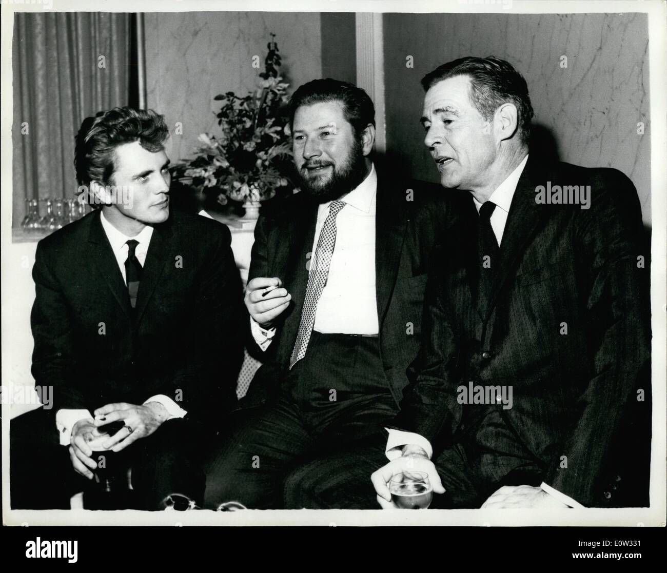 May 05, 1961 - Reception for stars of ''Billy Budd''. A reception was held this evening at the River Restaurant, Savoy Hotel, to meet Peter Ustinov and Hollywood star Robert Ryan who are to star in the new film ''Billy Budd'', location shooting for which commences in Alicante, Spain, on June 1st. Other members of the cast were present. Keystone picture shows: Peter Ustinov (with beard) Robert Ryan, the Hollywood star and Terence Stamp, an unknown 21 years old actor from Plaistow, London, who plays the role of ''Billy Budd'' in the new film, pictured at this evening's reception. Stock Photo