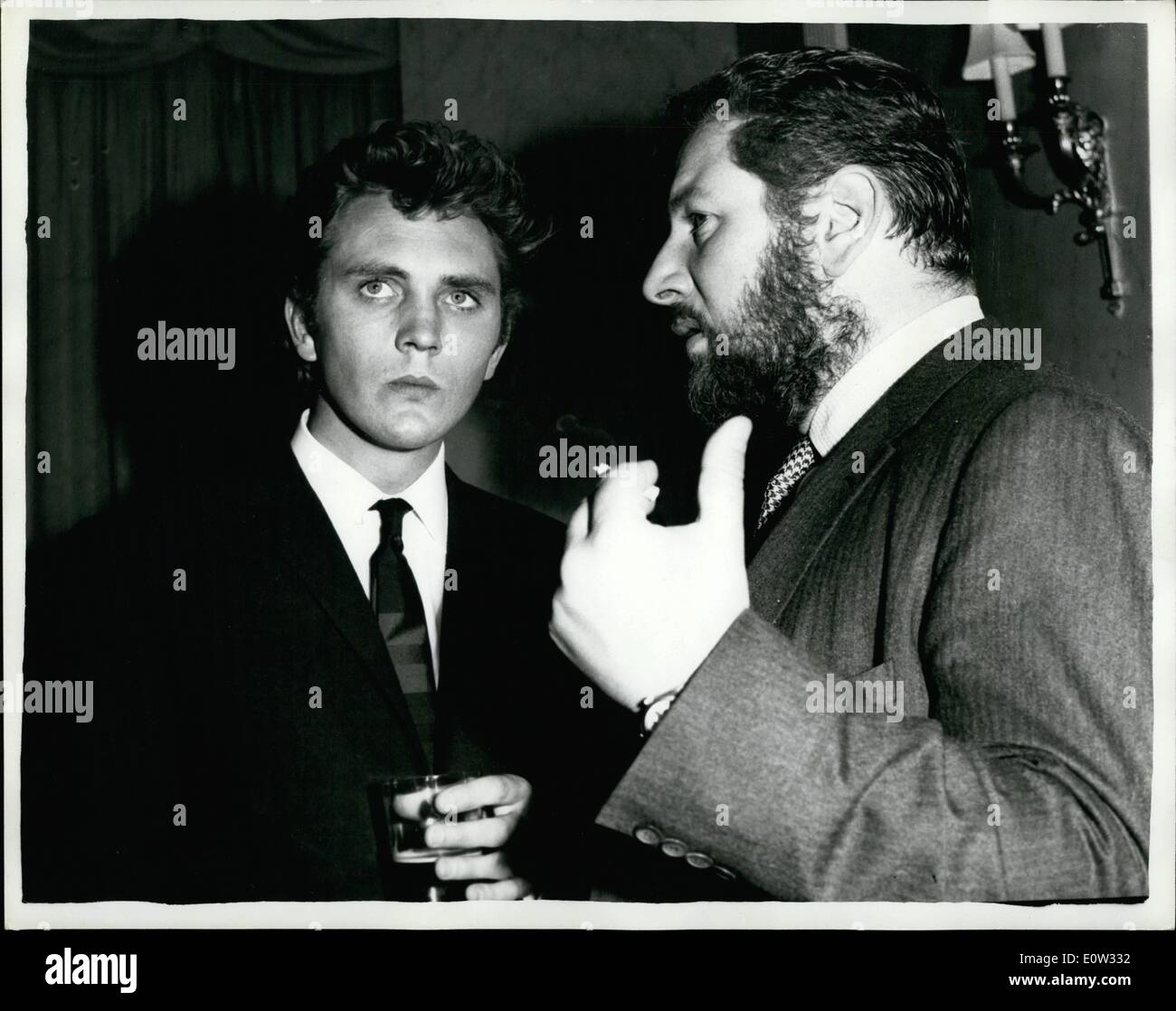 May 05, 1961 - Reception for stars of ''Billy Budd''. A reception was held this evening at the River Restaurant, Savoy Hotel, to meet Peter Ustinov and Hollywood star Robert Ryan who are to star in the new film ''Billy Budd'', location shooting for which commences in Alicante, Spain, on June 1st. Other members of the cast were present. Keystone picture shows: Peter Ustinov pictured at this evening's reception, with Terence Stamp, an unknown 21 years old actor from Plaistow, London, who plays the role of ''Billy Budd'' in the new film, Stock Photo