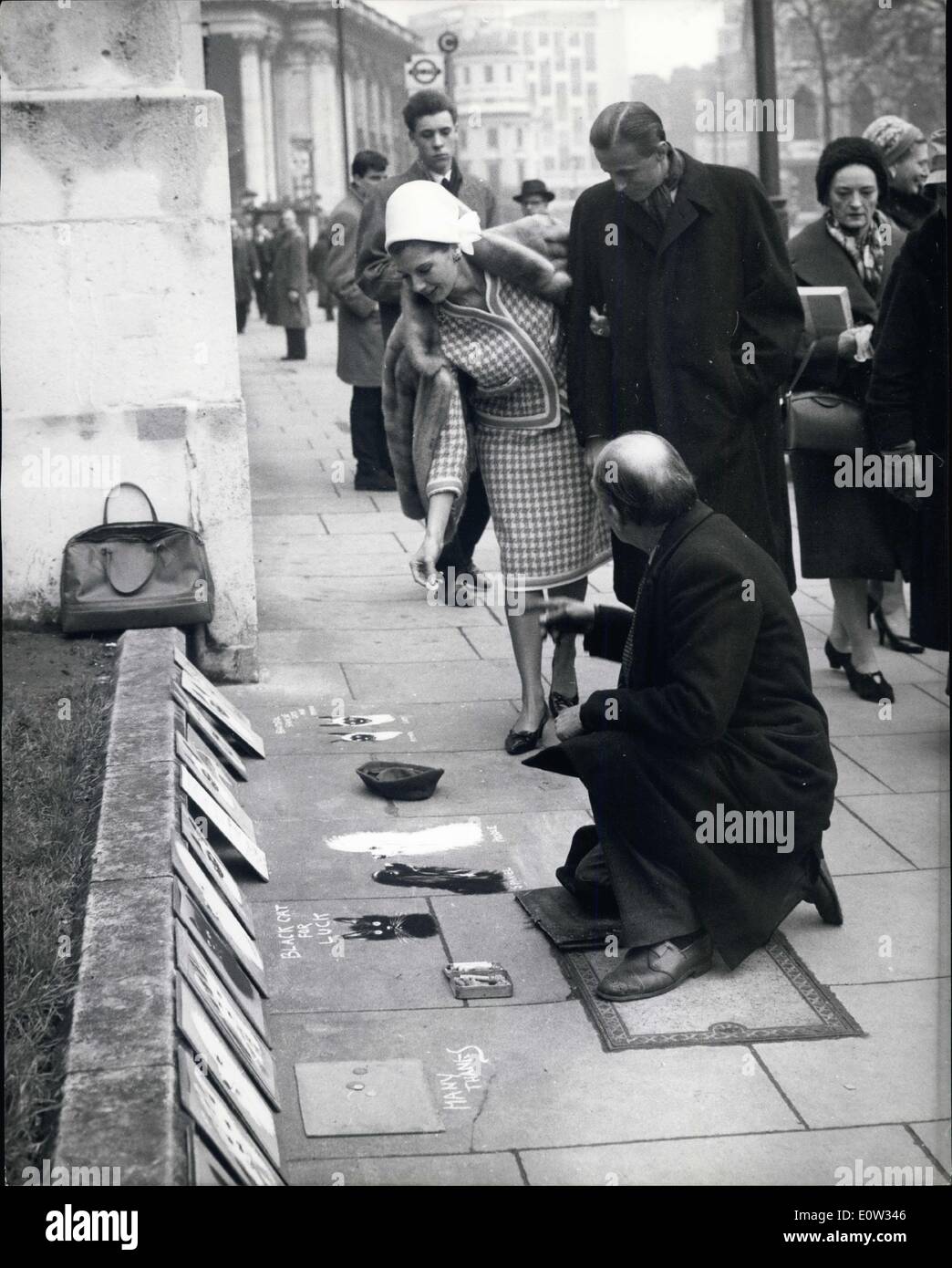 Mar. 02, 1961 - A Baroness Patronises The Pavement Artist: Baron Heinrich Thyssen, the multi-millionaire industrialist, went with his wife to the National Gallery yesterday to see the paintings he has lent them for exhibition. Works by Hals and Holbein, Goya, E1 Grece, Ucello - the smallest of them, Holbein's portrait of Henry V111, is worth half a million. The baroness, who used to be top model Fiona Campbell-Walter, walked docilely with the baron round the exhibition Stock Photo