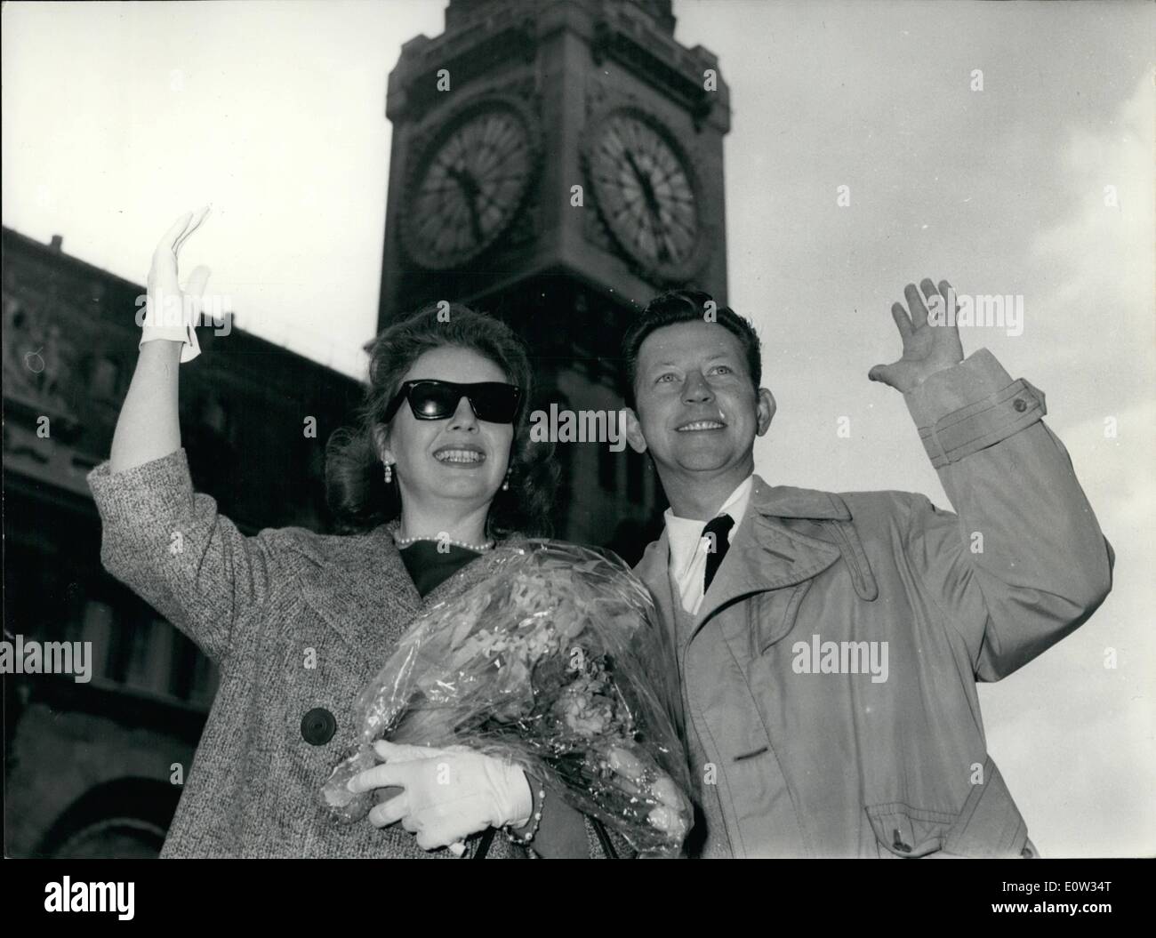Mar. 03, 1961 - Hollywood's best paid actor arrives in Paris; Donald O'Connor, Hollywood best paid actor (99 films) arrived in Paris from Rome to day. In his 100th film ''Arabian nights'' he plays the role of Aladin. Photo Shows Donald O'Connor and his wife Gloria pictured on their arrival at the care de Lyon this morning. Stock Photo