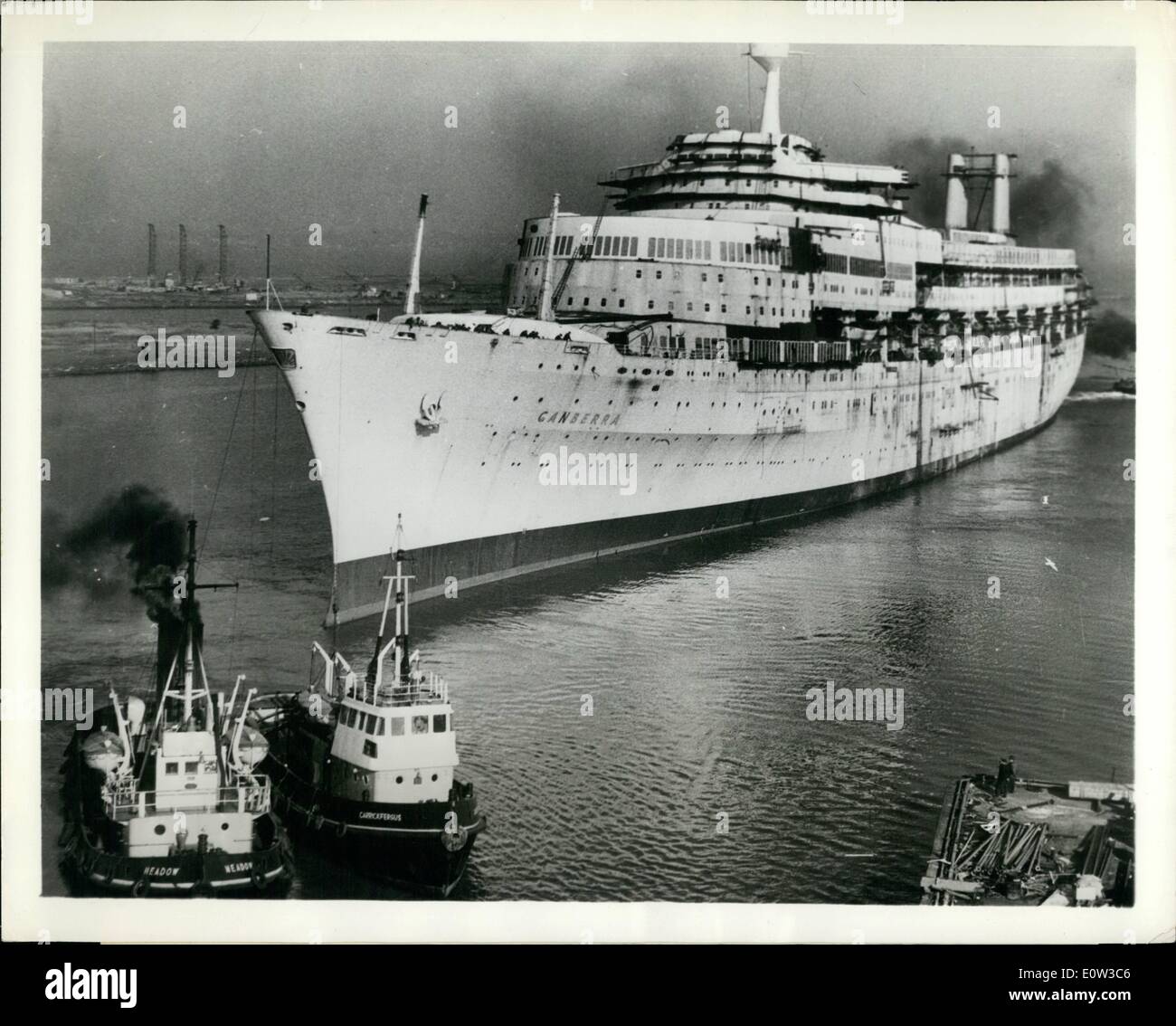 Mar. 03, 1961 - ''Funnellness'' Liner Ready Next Month.: The new 45,000 tons P. and O. liner Canberra is moved to a new berth at the Harland and Wolff Shipyard, Belfest, Northern Ireland, where she is due for completion next month. Normally funnels are replaced on her by two streamlined stacks aft. Costing 2 million, Britain's biggest post war liner, she will carry 2,250 passengers at a service speed of 27 1/2 knote beetween Britain, Australia, New Zealand and the United States West Coast Stock Photo
