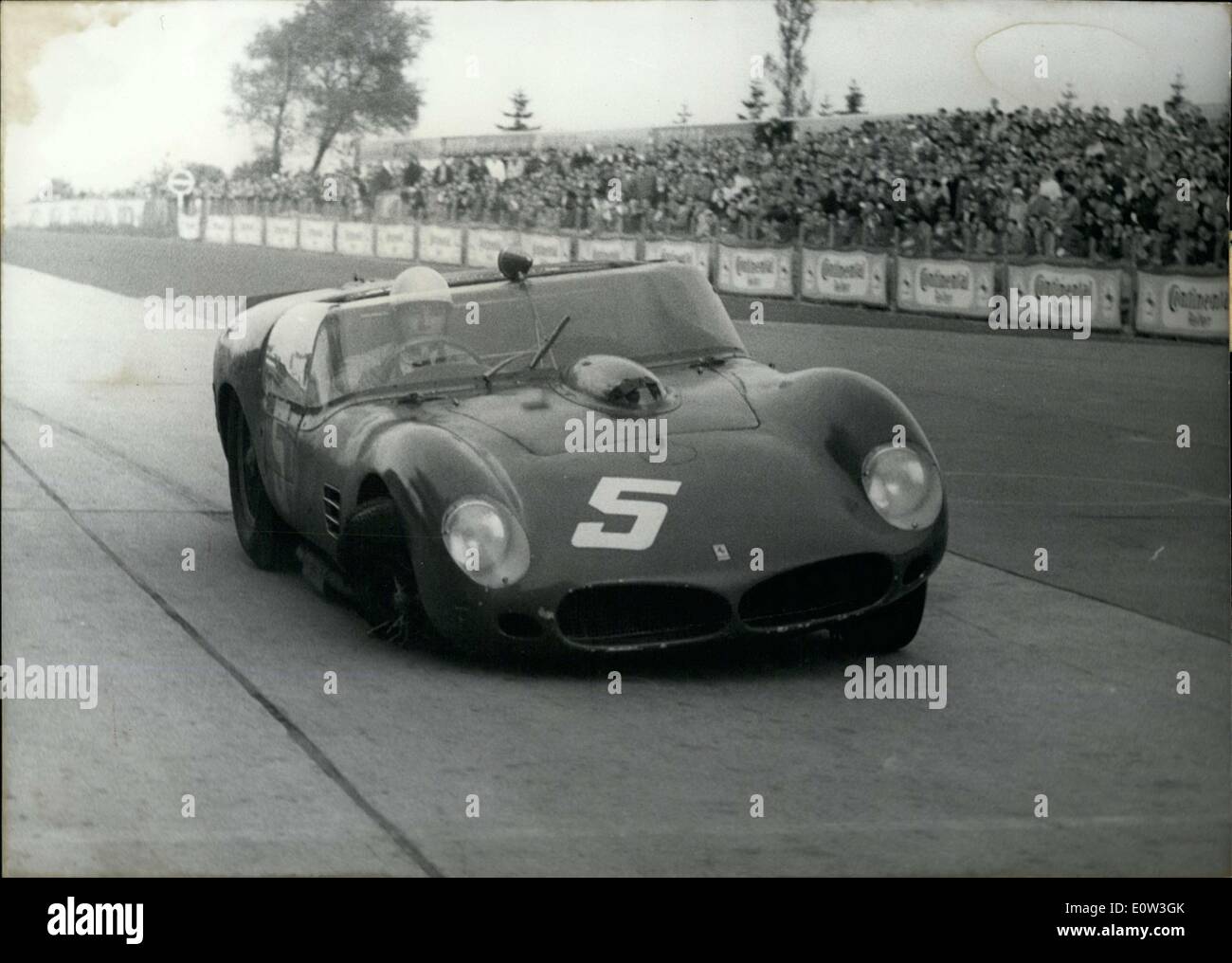 May 28, 1961 - Masten Gregory won the 7th International ADAC 1,000km Race in Nuerburgring in Germany on May 28, 1951. Pictured here is the Ferrari of the Rodriguez Brothers, which ended up with a flat tire during a section of the race. Stock Photo
