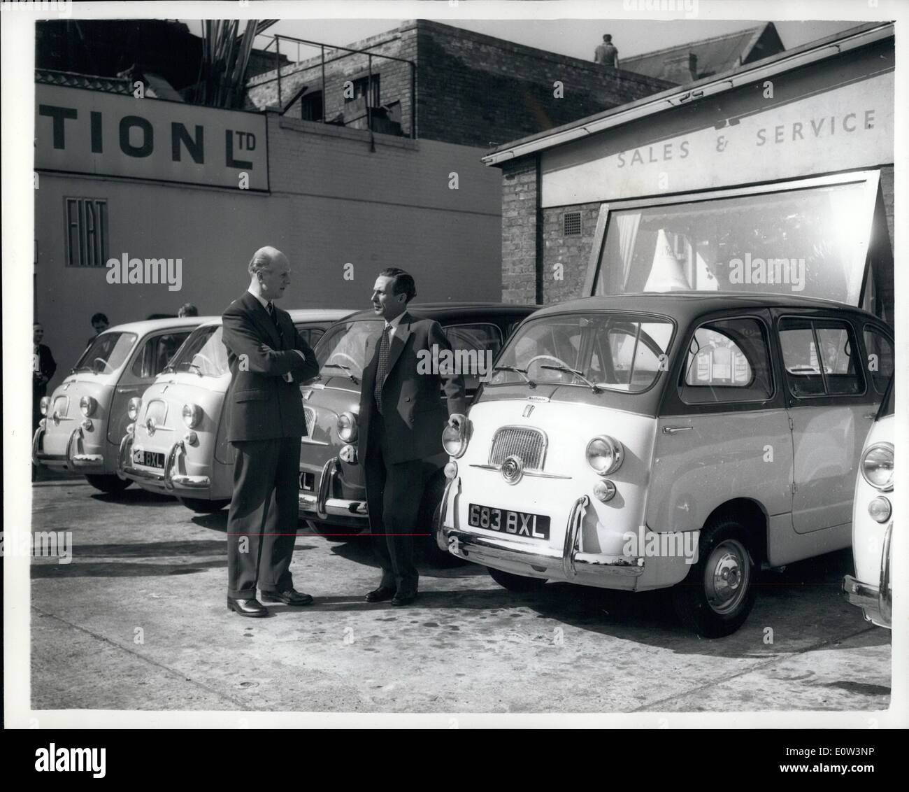 Mar. 03, 1961 - London's first mini cabs ready for services flat 600 G. C. Vehicles.: London's first ''mini-cabs'' were to be seen at a Vauxhall Bridge road, service station this morning. The Sylvester car hire company is to start a service on Monday with a fleet of 25 flat. Multiplas radio- controlled cabs on Monday and augment the fleet by five a week. He plans to charge 1/6d, for first mile plus 1/- each additional miles. The cabs will not play for hire- but will have to carry only two passengers. No extra charge will be made for luggage. Photo shows Mr Stock Photo