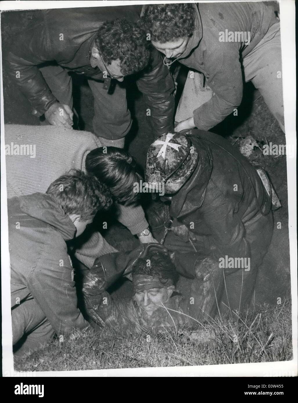 Apr. 04, 1961 - Potholer rescued in fifteen hour drama, Struggle at Simon's Pot, Kingsdale, nr. Ingleton-Yorkshire. More than 100 rescuers toiled for fifteen hours yesterday to bring 21 year old potholer Graham Shaw to the surface. The drama went on all night for Shaw was struck by a falling rock when a ladder gave way, and he lay at the bottom of the pothole with a broken leg and head injuries - and in need of a blood transfusion . After his rescue he was given be taken to hospital - where his condition is said to be satisfactory Stock Photo
