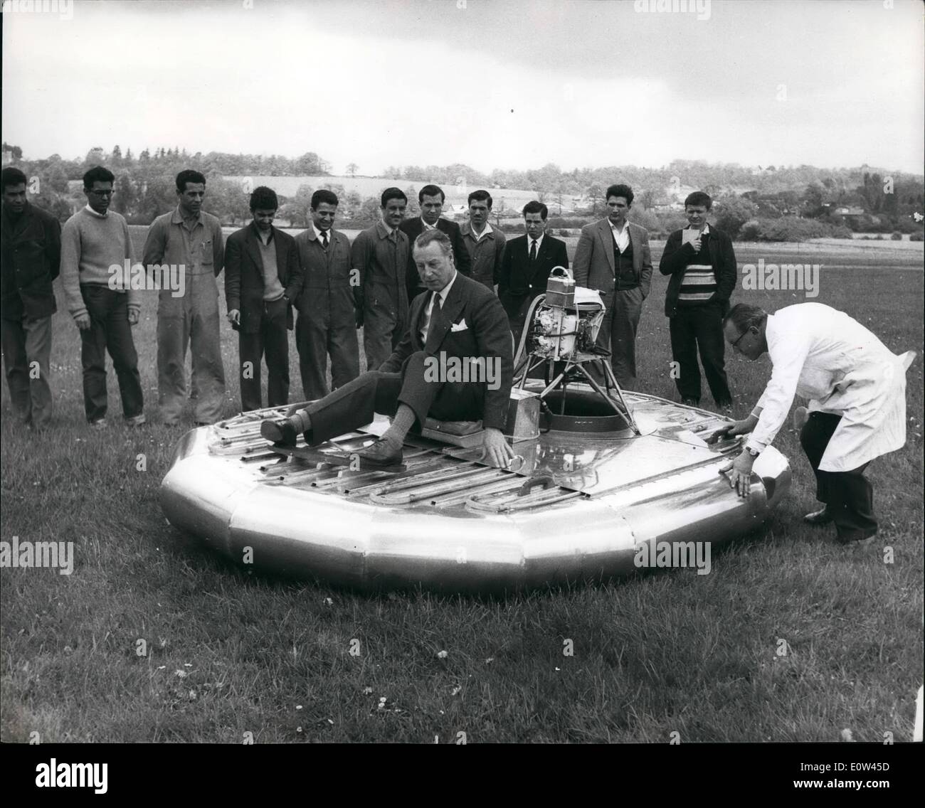 Apr. 04, 1961 - A &pound;70 Hovercraft Is Put Through Its Paces At Redhill Airfield. Another addition to Britain's steadily lengthening list of hovercraft, designed by Mr. Donald Robertson, a former test pilot, and built by the designer and staff and students of an engineering college, was demonstrated at Redhill Airfield, Surrey. It took two days to design and the materials cost &pound;70. Known as the Skimmer, it is claimed to be Britain;s first privately built hovercraft. Weighing only 250 pounds, it is powered by a 40 hp water-cooled outboard motor Stock Photo