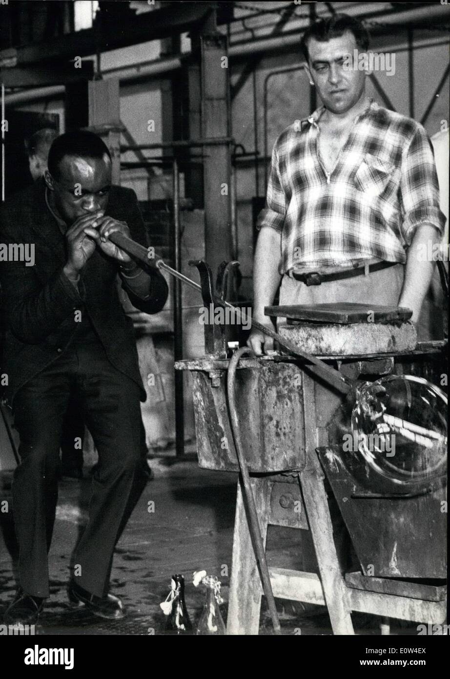 Apr. 04, 1961 - Too hot for Jazz pianist Oscar Peterson Oscar Peterson ,the ''hot'' Jazz Pianist, was not able to do what his timpanist Ed Thigpen did with bravour ; During their Germany tournee they visited the WMF glass works in Geislingen and after a successful concert of the Oscar Peterson Trio in Geislingen, The well known timpanist played a rather unusual instrument and blew glass. Stock Photo