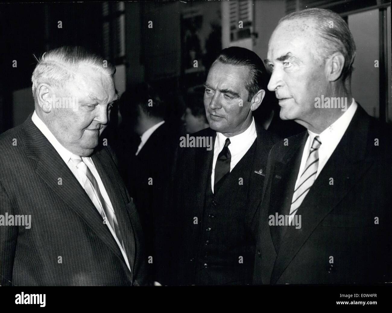 Apr. 04, 1961 - First Meeting of Krupp-representatives in foreign countries On April 25th the first meeting of the Krupp-representatives in foreign countries was opened by Alfried Krupp von Bohlen und Halback in Essen (ALFRIED KRUPP VON BOHLEN AND HALBACH). Abdul 24 representatives in 54 countries were present at this meeting, at which Minister of Economics Ludwing Erhard held a speech. OPS: (left to right) Minister of Economics Ludwig Erhard, authorized Krupp-agent Berthold Beitz (BERTHOLD BEITZ) and Alfried Krupp von Bohlen und Halbach Stock Photo