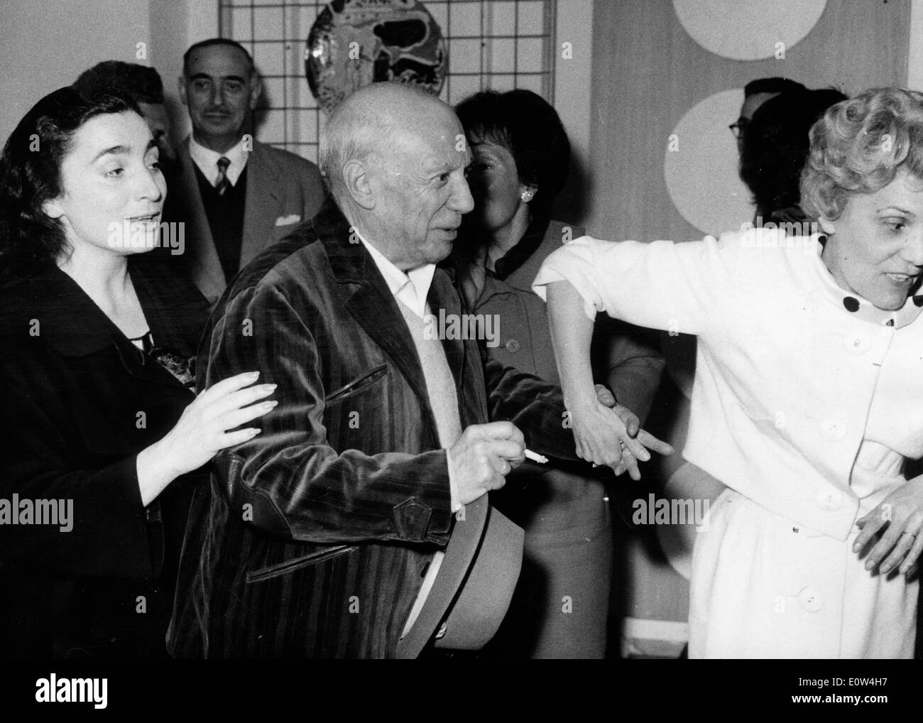 Artist Pablo Picasso with Mademoiselle Ramier and his wife Jacqueline Roque at his gallery exhibition Stock Photo