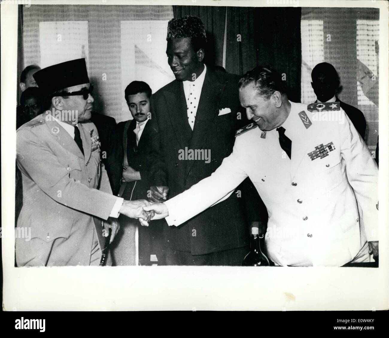 Jun. 06, 1961 - President of Yugoslavia - Pres. Soekarno and Pres. Mddibo Keita - in Belgrade - President Tito of Yugoslavia had a meeting with his two Visitors - Pres. Soekaring of Indonesia and Pres. Modibo Keita of Mali - at the Airport of Batajnio near Belgrade - Keystone Photo Shows:- Pres. Soekarno (left) shaking hands with Pres Tito and President Modibo Keita - when they met at the Batajnice airport Stock Photo